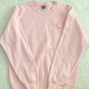 pink smiley face crewneck size m